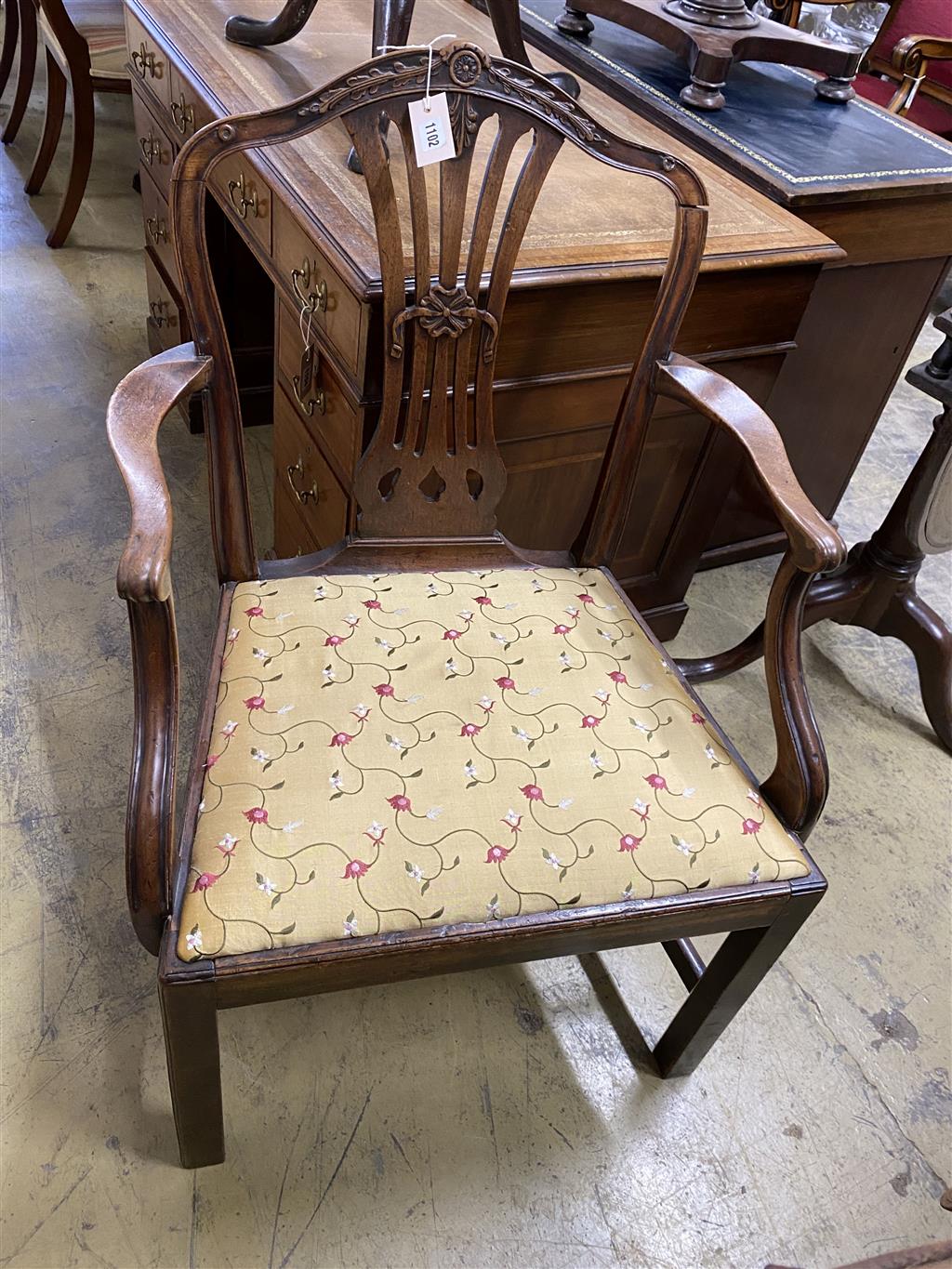 A George III Hepplewhite style mahogany elbow chair